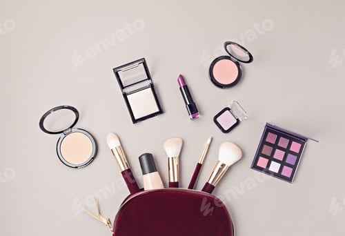Preview: Flat lay with set of professional decorative cosmetics, makeup tools and woman accessories over gray