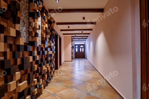 Preview: Hotel lobby with a framed cubic wooden panel with picture inserts