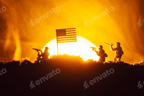 Preview: Battle scene with toy warriors near american flag in smoke with sunset at background