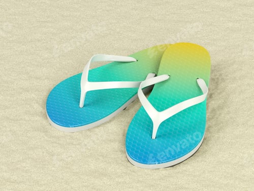 Preview: Blue and Yellow Flip Flops on Sandy Beach