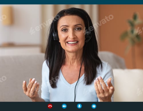 Preview: Mature Woman Wearing Headset Having Video Conference