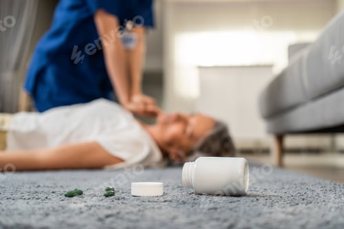 Preview: Asian caregiver saving senior woman's life by doing cpr in emergency.