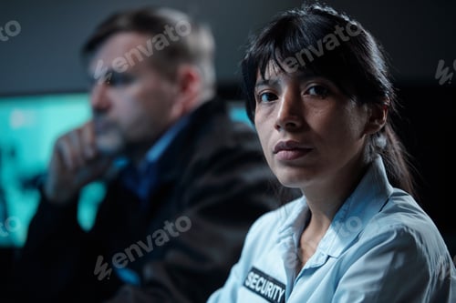 Preview: Confident security guard in uniform