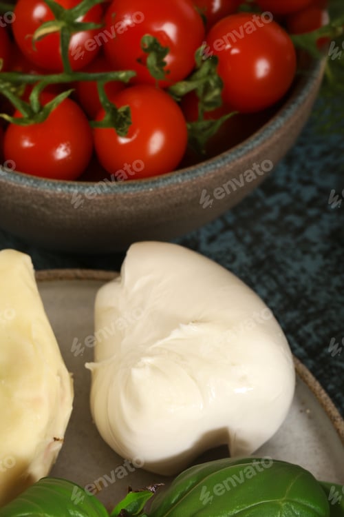 Preview: assorted cheeses for snacks on a board