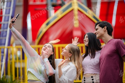 Preview: group of friend are happy and fun together at amusement theme park, outdoor activity