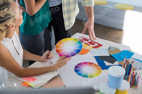 Preview: Executives looking at color shade swatch