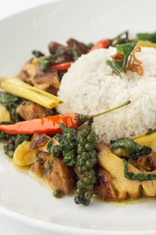 Preview: Pad Krapow Gai spicy Thai Chicken Vegetable Stir Fry on white plate