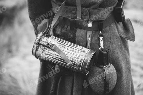 Preview: Re-enactor Dressed As German Wehrmacht Infantry Soldier In World War Ii On Marsch. View From Back