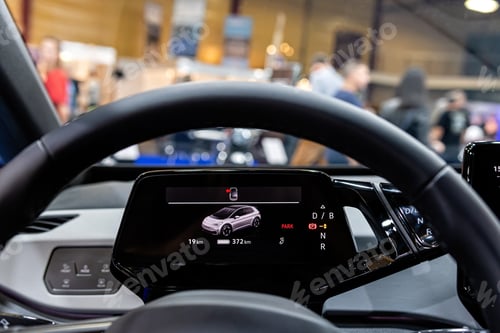 Preview: electric car interior digital dashboard with touchscreen functions, close-up