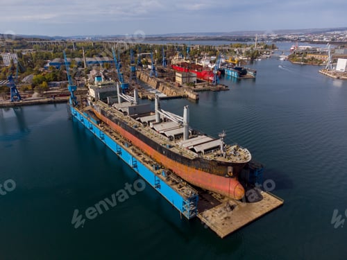 Preview: aerial view shipyard dry dock maintenance and repair cargo ship transport and oil ships in sea