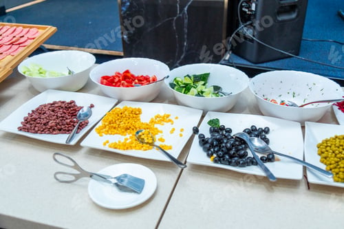 Preview: Salad Ingredients Laid Out on Buffet