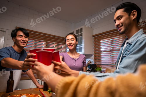 Preview: Group of Asian friend having dinner, enjoy evening party together at home.
