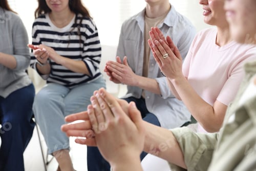 Preview: People applauding during meeting indoors, closeup view