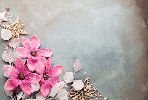 Preview: Beautiful Christmas pink flower on vintage blue background.