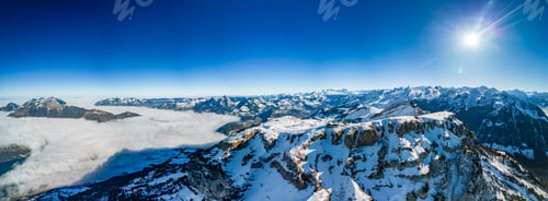Preview: Aerial drone view of snow covered ski slopes at Stoos,Switzerland