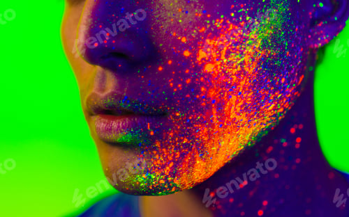 Preview: Fashion model with fluo painting on the face