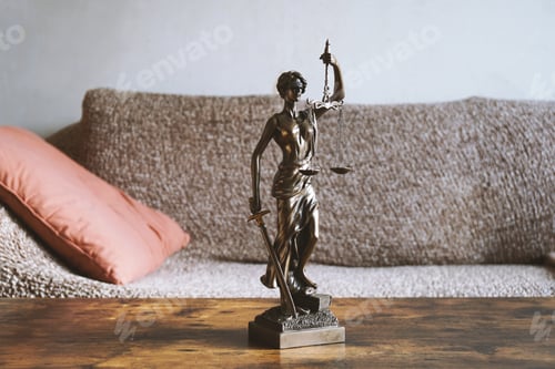 Preview: lady justice or justitia statue on table - landlord and tenant law