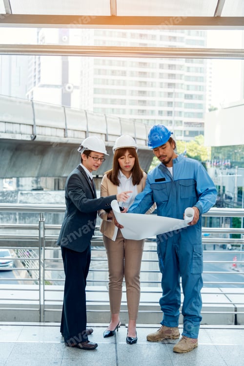 Preview: Contractor construction engineer meeting together architect table at construction office site