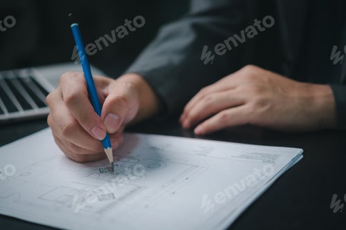 Preview: Architect and engineer collaborating working interior blueprint of a planning residential house,