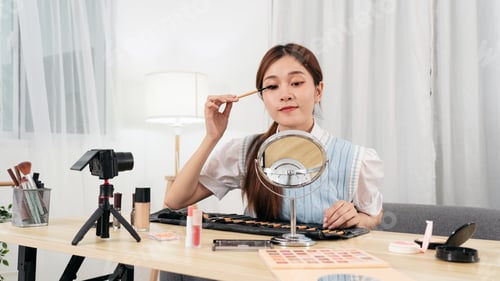 Preview: Young beauty influencer is using mascara product to testing and