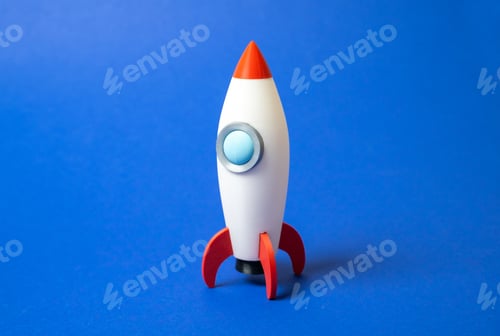 Preview: Space rocket on blue background. Concept of space aerotechnics. Advertising, startups.
