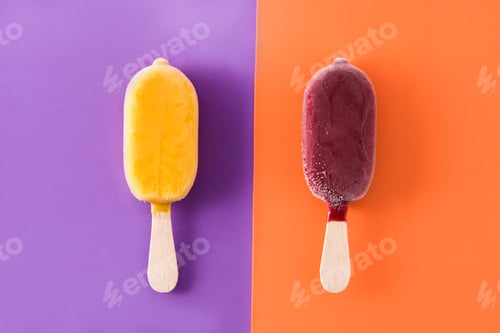 Preview: Yellow and red popsicles on violet and orange background