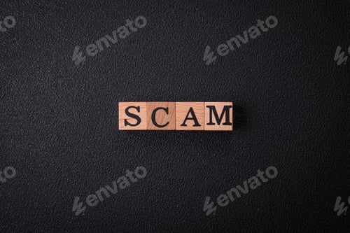 Preview: The inscription Scam made of wooden cubes on a plain background