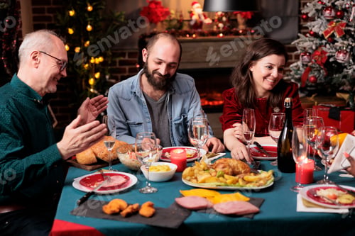 Preview: Senior and young people on christmas eve