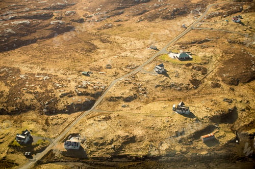 Preview: Aerial view of a rustic landscape with scattered houses