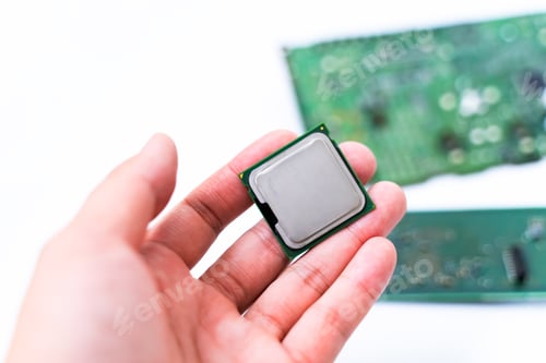 Preview: IC CPU in hand with PCB board background. Concept of Technology computer and hardware computer.