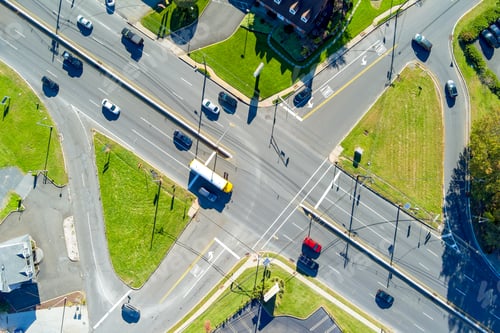 Preview: An aerial view of a road intersection with heavy traffic moving during rush hour