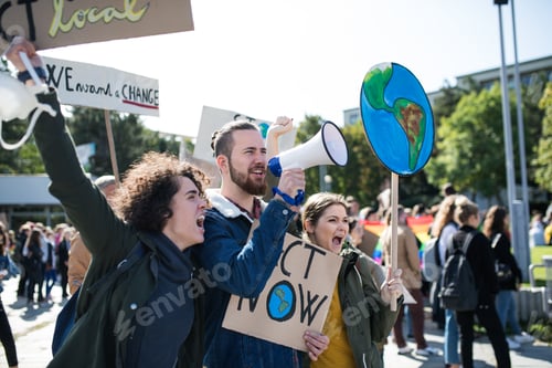 Preview: People with placards and amplifier on global strike for climate change.