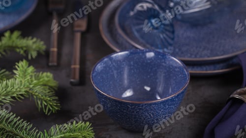 Preview: Dark blue christmas decoration with fir-tree branch.