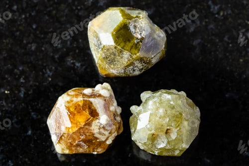 Preview: sample of three grossular garnet crystals on black
