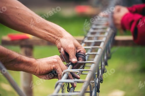 Preview: Construction Worker hands using Welding machinery iron metal sparking. Men hands protective glove