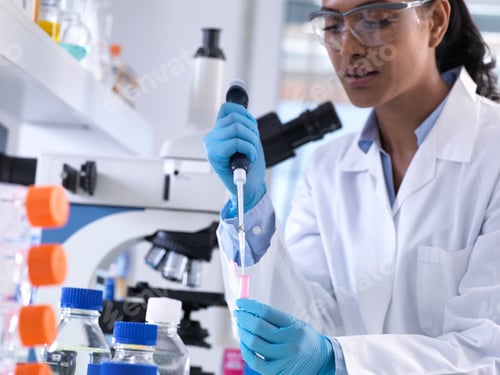 Preview: Genetic research, female scientist pipetting DNA