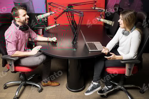 Preview: Couple of radio presenters during a live show