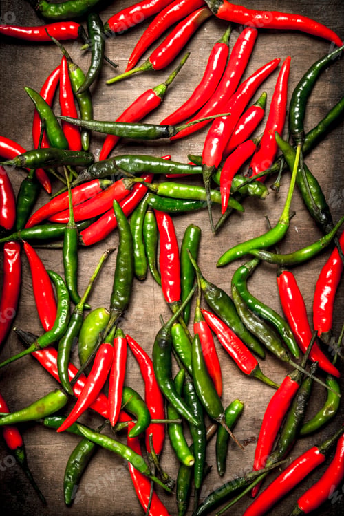 Preview: Ground red hot chili pepper on a tray.
