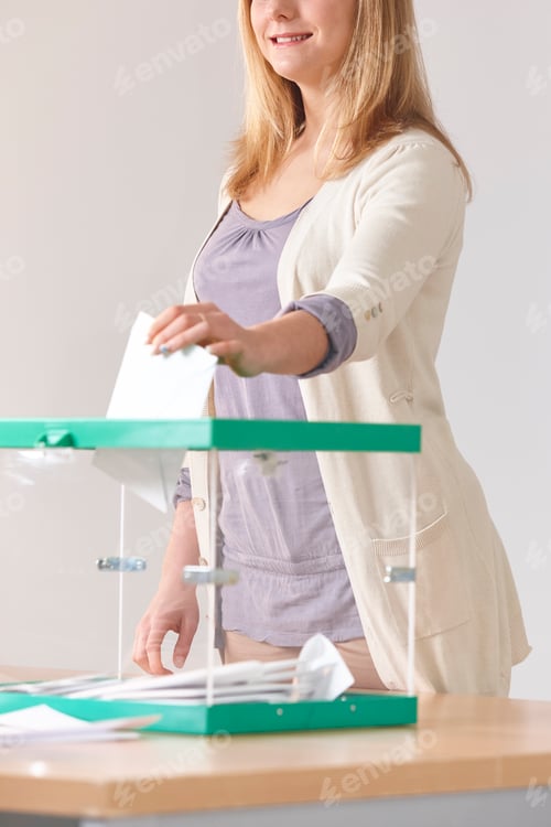 Preview: Woman at polling station. Democracy elections. Referendum. Government