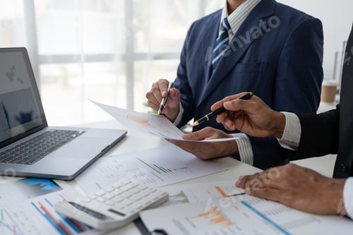 Preview: business people meeting in the office Calculate company tax and investment income Strategic planning
