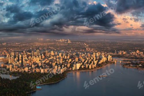 Preview: Aerial view of Downtown City during a vibrant sunset