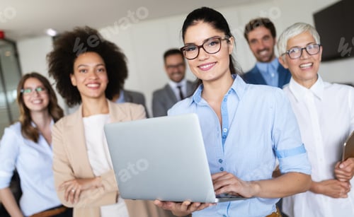 Preview: Group of successful business people at work in office