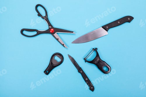 Preview: Top view of cooking utensils composition in kitchen isolated on blue background