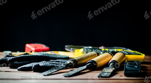 Preview: Various construction tools on the table.