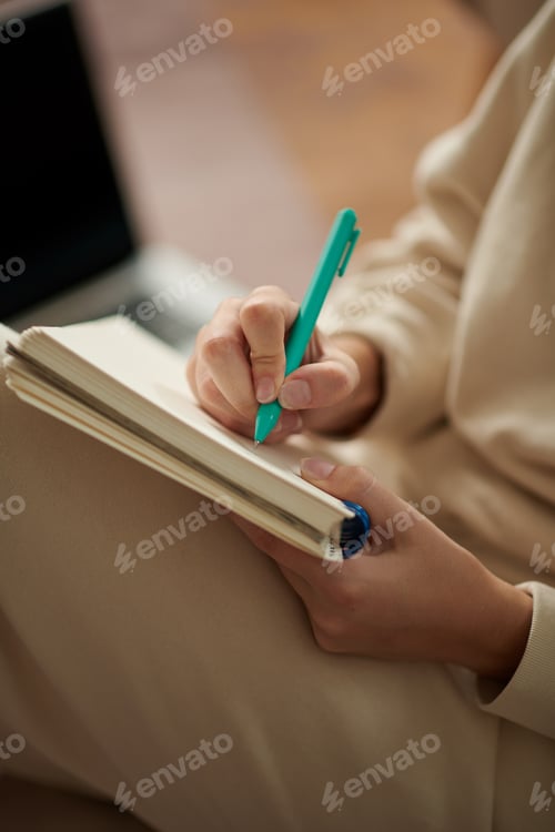 Preview: Woman Filling Gratitude Journal