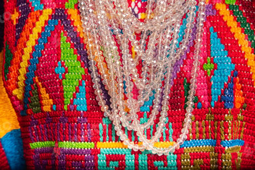 Preview: A colorful necklace with a clear chain is displayed on a colorful background