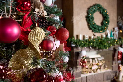 Preview: Beautiful new year room with decorated Christmas tree, gifts and fireplace with the glowing lights