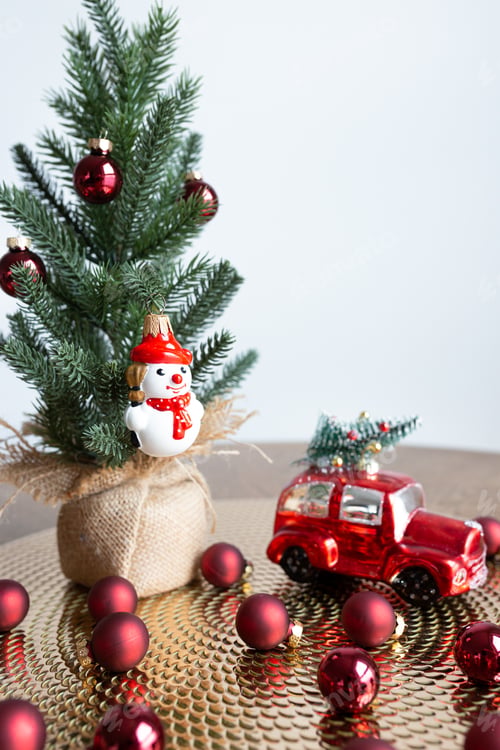 Preview: Festive Holiday Decorations and a Red Toy Car