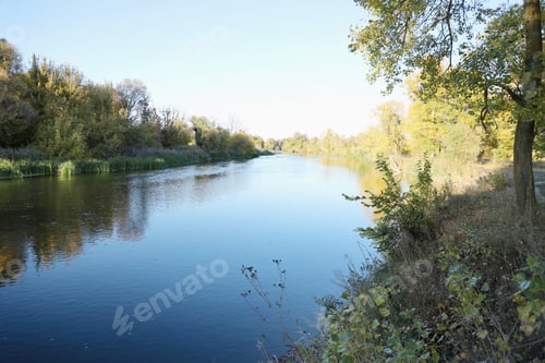 Preview: Beautiful autumn landscape with lake and multicoloral trees