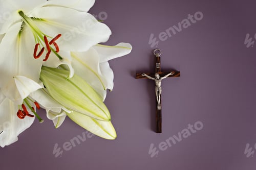 Preview: A symbolic Christian composition with christian cross lies beside a fresh white lily